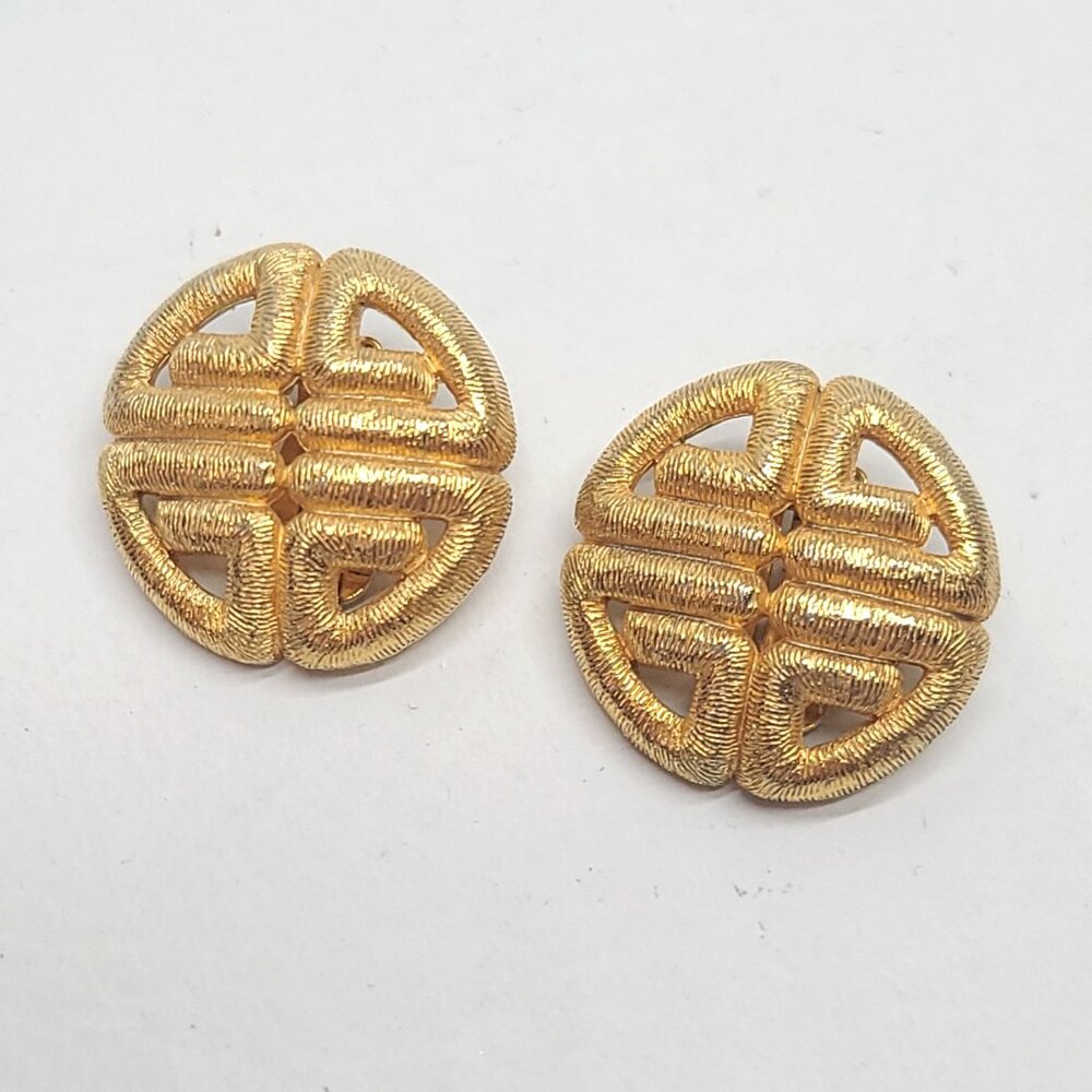 Large Givenchy Paris New York gold tone clip earrings Celtic knot textured round